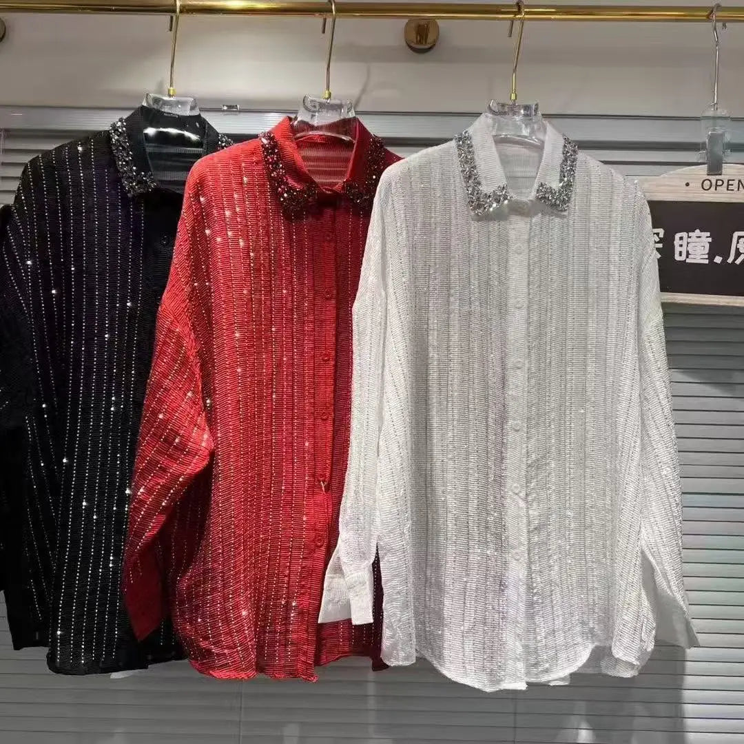 Three button-down shirts in black, red, and white, featuring vertical rhinestone stripes and jewelled collars.
