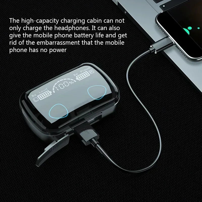 Black wireless earphone charging case with a digital battery display charging a smartphone via a USB cable.