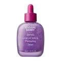 Purple shimmering plumping bakuchiol serum in a 30ml glass dropper bottle with a dark pink cap.