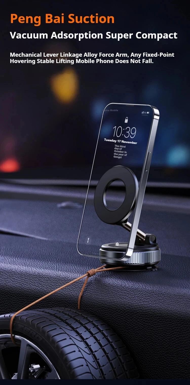 Compact silver and black magnetic phone holder for car dashboards, featuring an adjustable alloy arm and suction base.