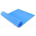 A blue, flat, rubber resistance exercise band partially rolled up against a plain white background.