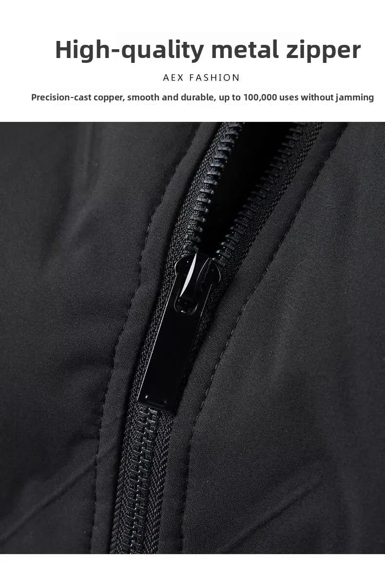 Close-up of a high-quality black metal zip on a padded men's work jacket.