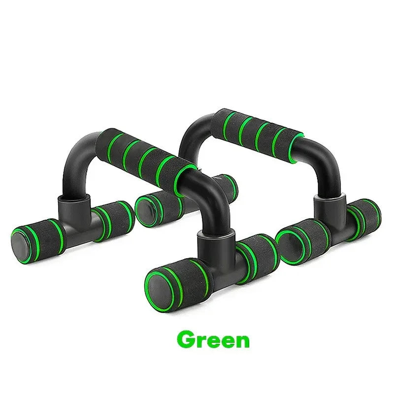 Pair of black and neon green push-up bars with foam-padded handles, isolated on a white background.