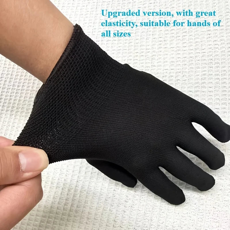 A hand wearing a stretchy, black fabric glove designed for touchscreen or artistic use, shown being pulled for fit.