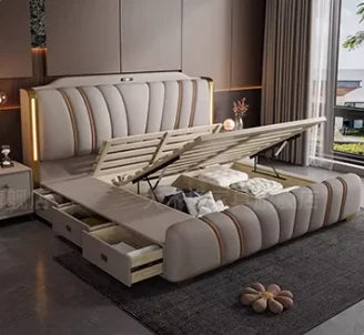 Luxury cream upholstered ottoman bed with vertical fluting, integrated headboard lighting, and side storage drawers.
