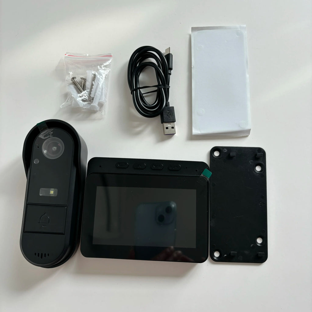 Black wireless video doorbell kit with 4.3in screen, night vision camera, mounting hardware and charging cable.