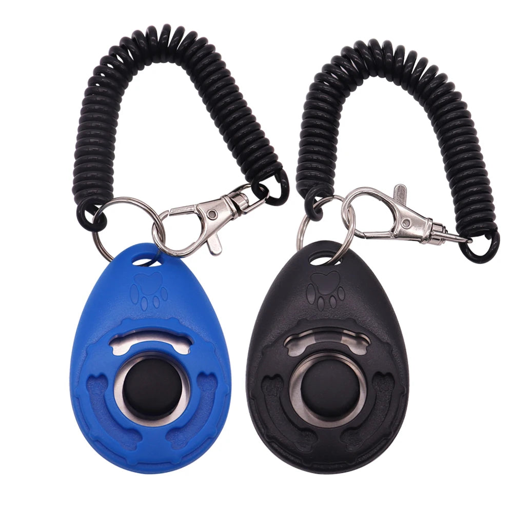 Blue and black dog training clickers with central buttons, paw print detailing, and coiled wrist straps with clips.