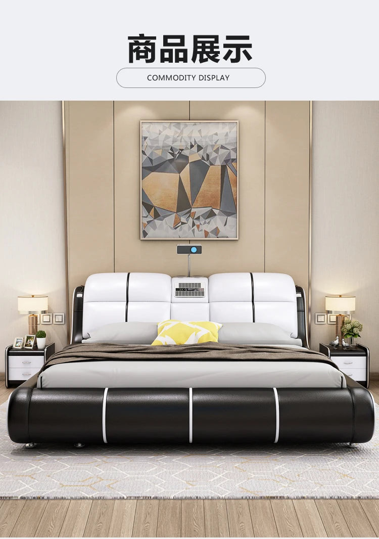 Modern bed frame in cream and black leather with a curved, cushioned headboard and integrated tech features.
