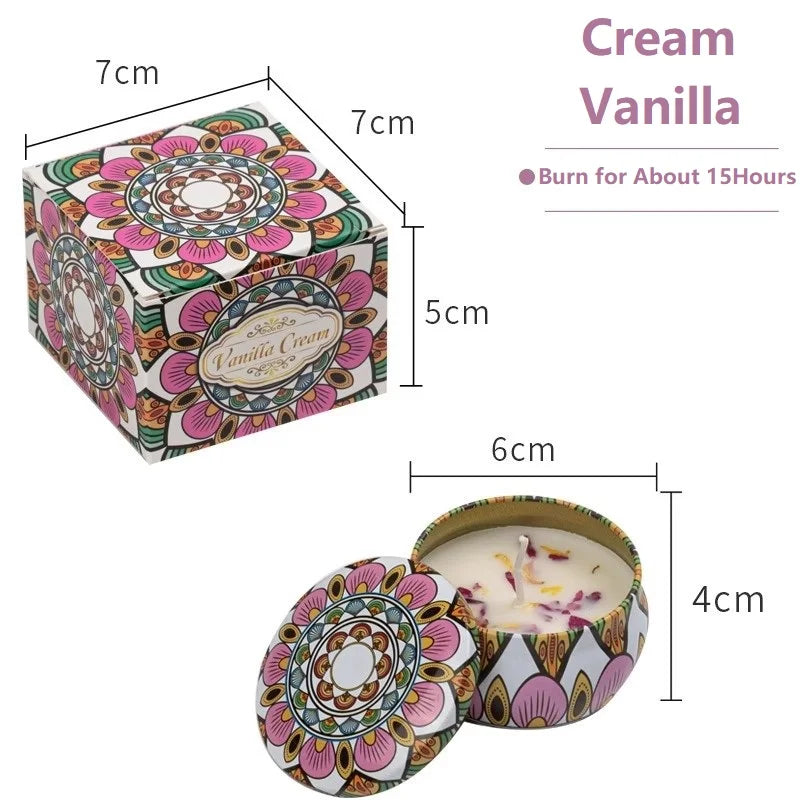 Vanilla cream scented candle in a decorative tin with pink, gold, and green mandala-style pattern. 15-hour burn time.