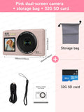 Pink dual-screen 5K digital camera with 18x zoom, 32GB SD card, gray storage bag, wrist strap, and charging cable.