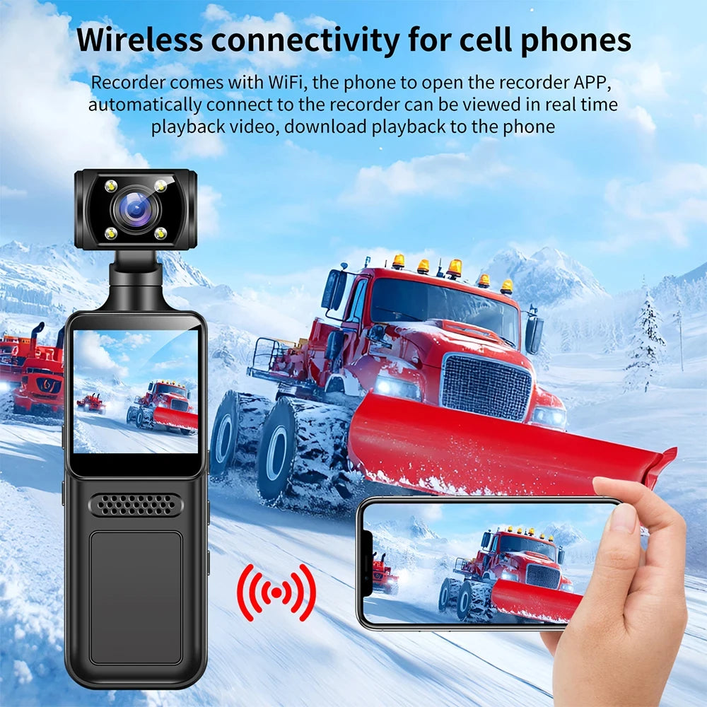 Black plastic dash cam with screen and Wi-Fi connectivity for smartphone streaming against a snowy landscape background.
