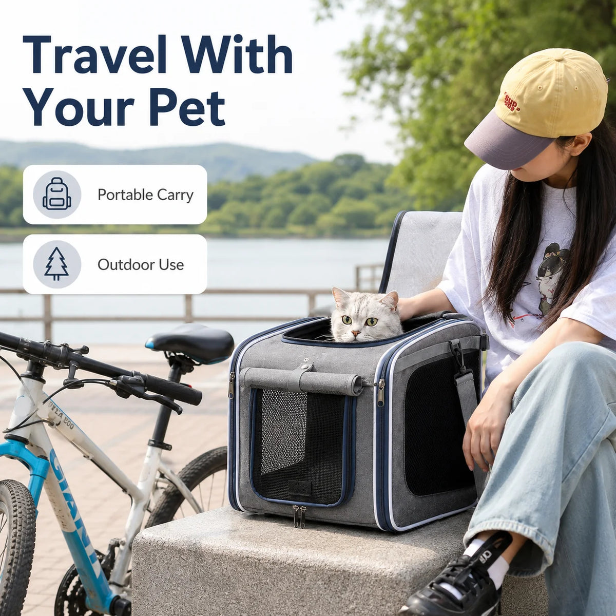 Grey pet carrier backpack with mesh windows containing a cat, beside a bicycle.