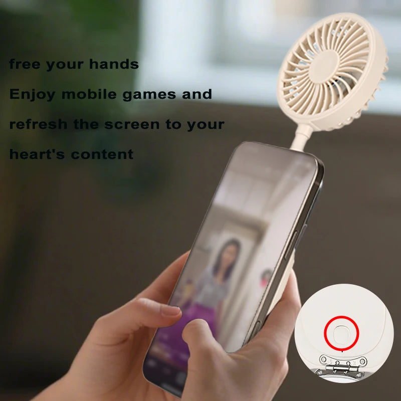 Beige portable phone-cooling fan attached to a smartphone, designed for hands-free cooling while gaming.