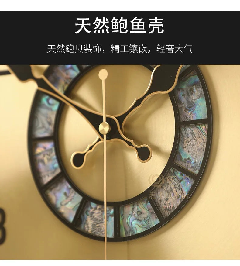 Minimalist gold metal wall clock featuring a black border with iridescent abalone shell inlays and elegant hands.