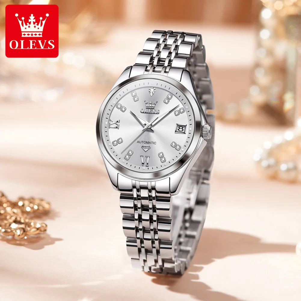 Elegant women's stainless steel automatic watch with a silver sunray dial, crystal markers and date window.