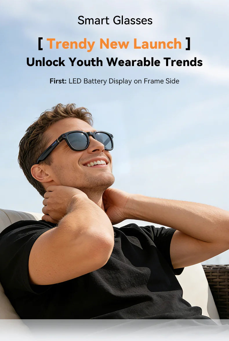 Man wearing sleek black smart camera glasses featuring a side-mounted LED battery display.