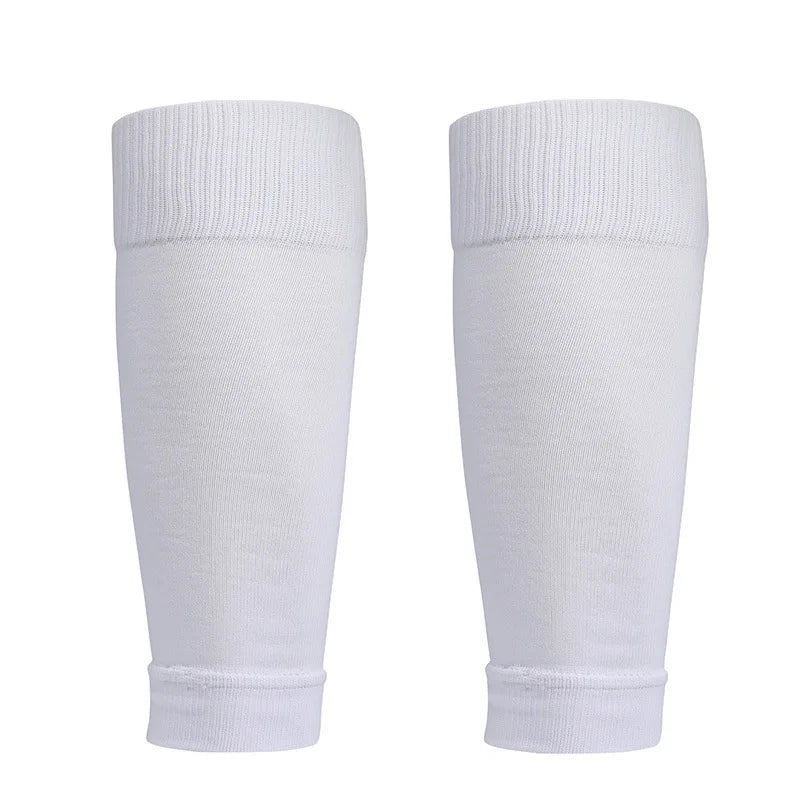 Pair of plain white football shin guard sleeves with a comfortable, stretchy ribbed cuff design.