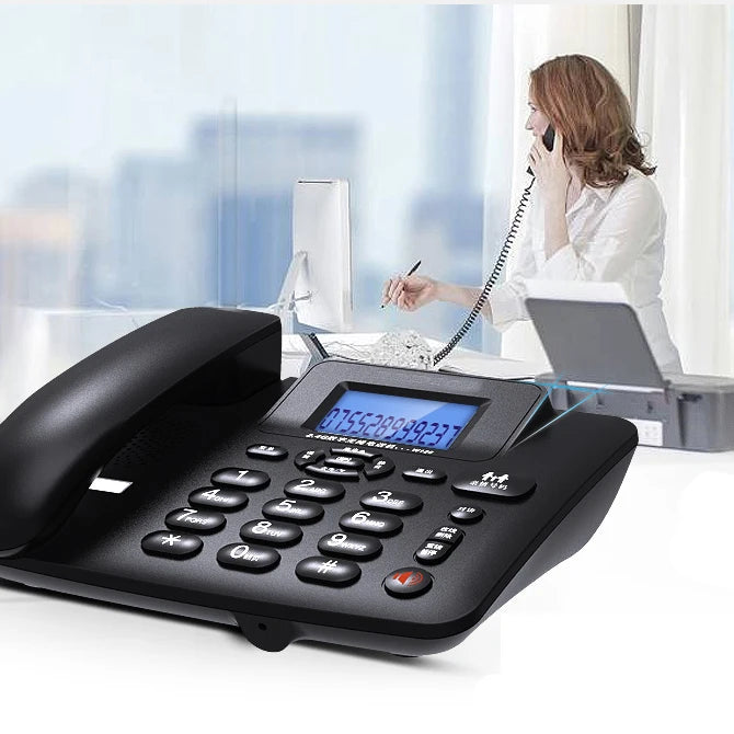 Black corded desk phone with large buttons, blue digital caller ID display, and speakerphone functionality.
