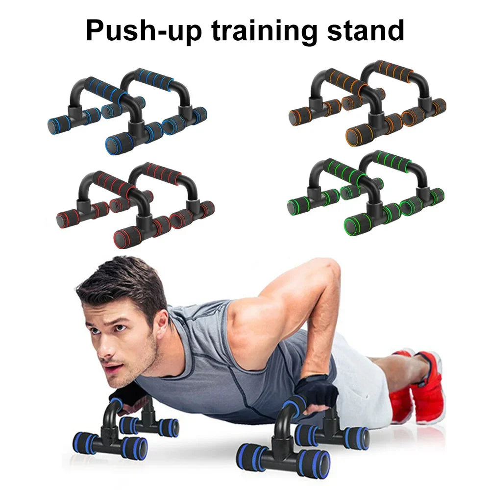Man doing push-ups with black training stands featuring blue, orange, green, or red padded foam grips.