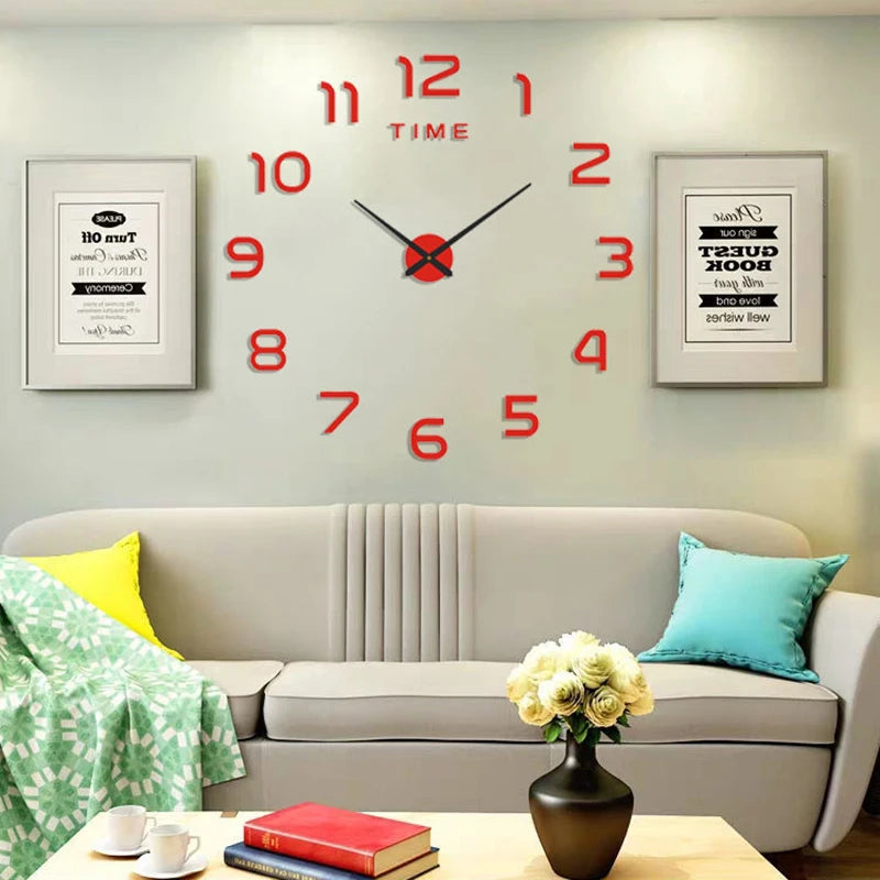 Large, modern red acrylic wall-mounted clock with stick-on numbers and black hands, displayed above a living room sofa.