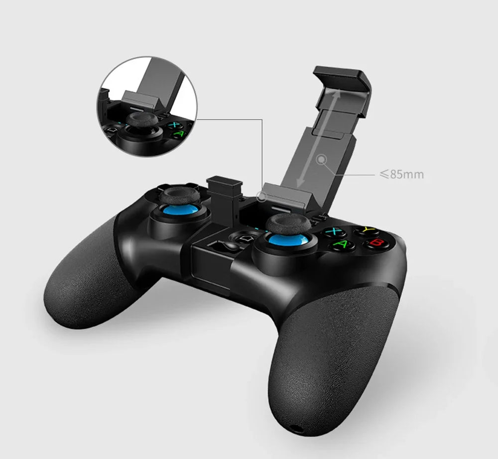 Black wireless game controller with an integrated phone mount, blue joystick bases, and colorful action buttons.