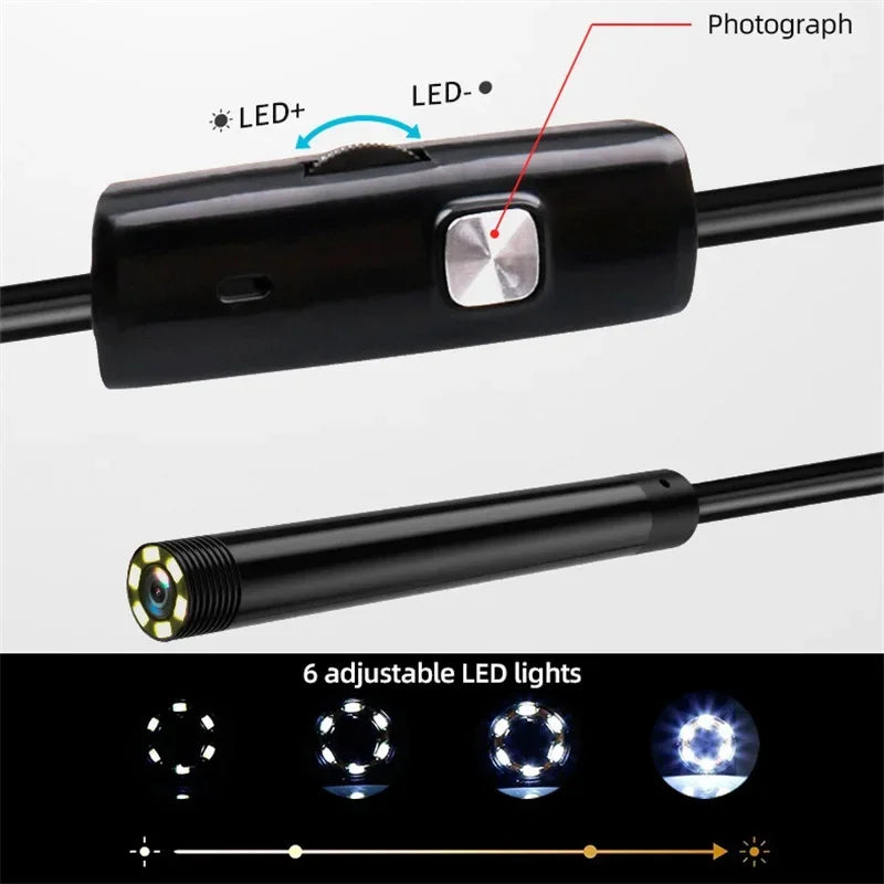 Black endoscope camera with a control unit featuring a photograph button and adjustable LED brightness dial.