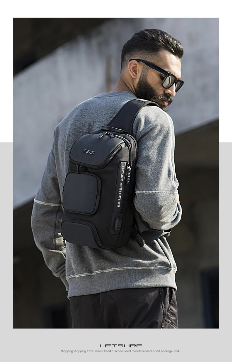 A man wears a sleek black, multifunction crossbody bag with multiple zip pockets and a modern, compact design.