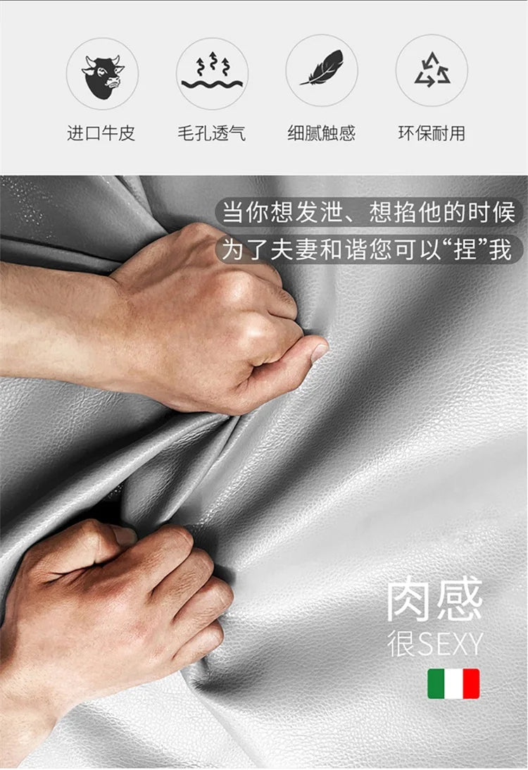 Close-up of high-quality, soft grey leather upholstery showing texture and flexibility.