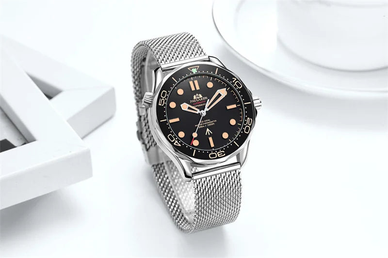 Classic men's stainless steel watch with a black dial, rotating bezel, and silver mesh bracelet strap.