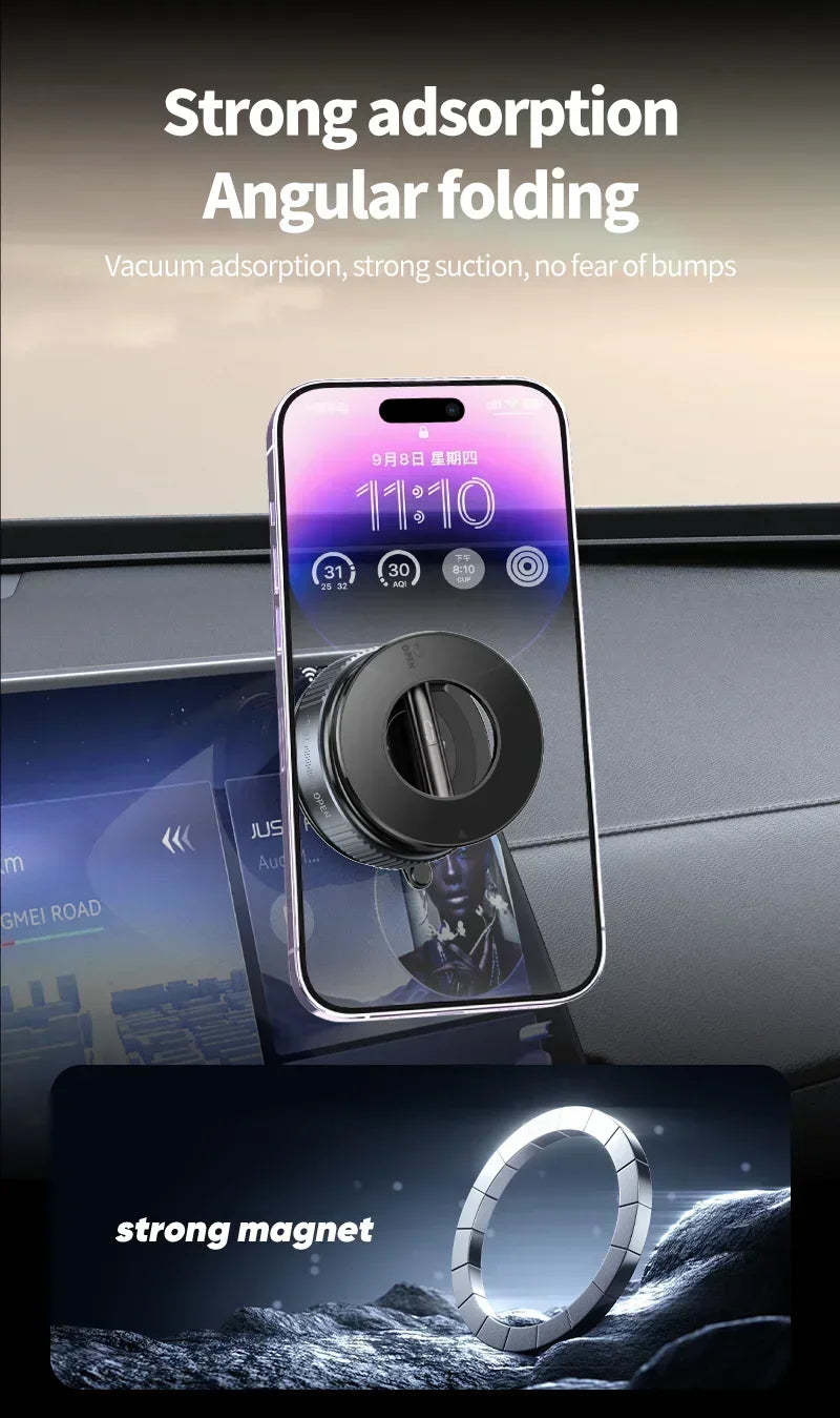 Black circular magnetic car phone mount attached to a smartphone mounted on a vehicle dashboard.