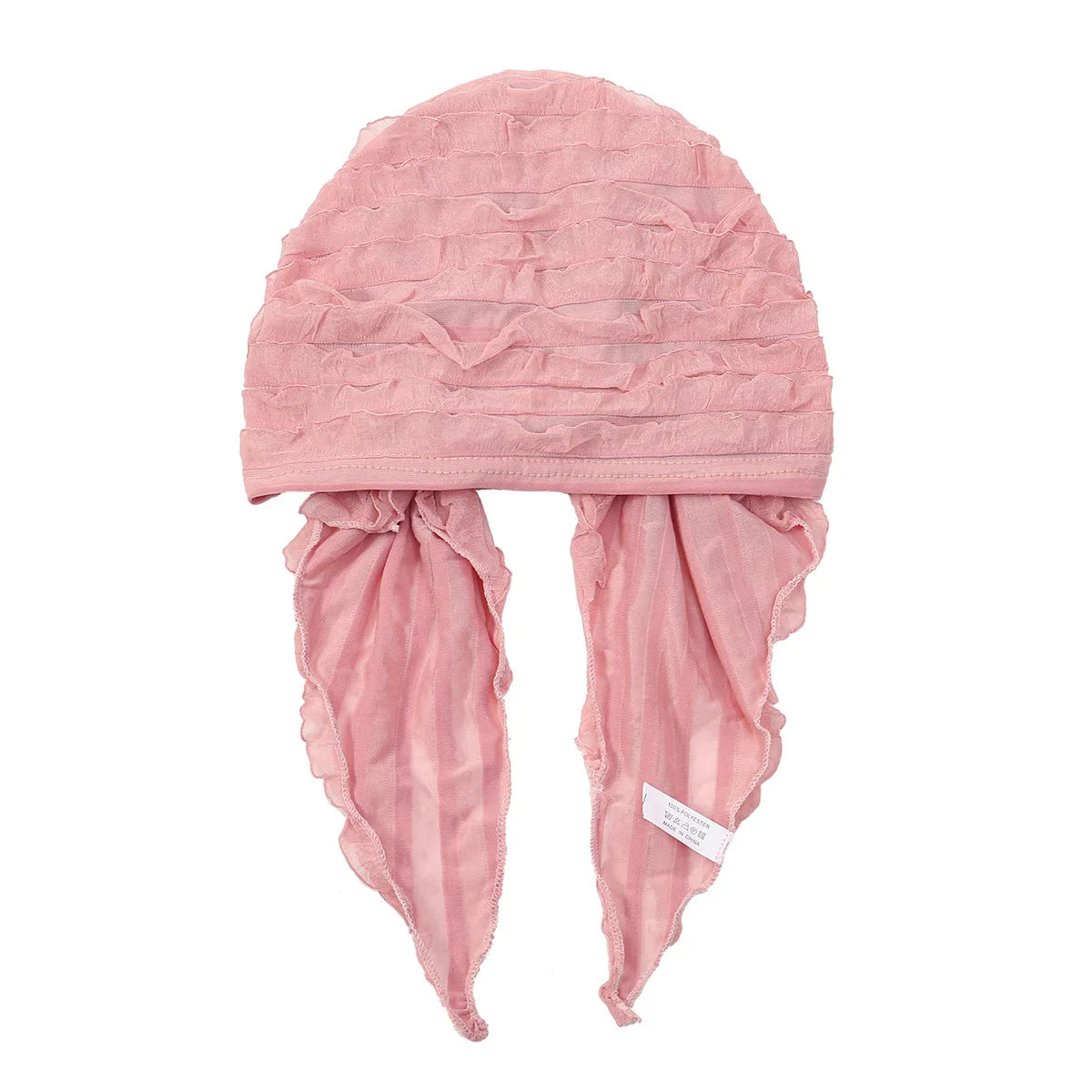 Dusty pink pre-tied elastic turban head wrap with textured ruffle detailing and two soft hanging side ties.