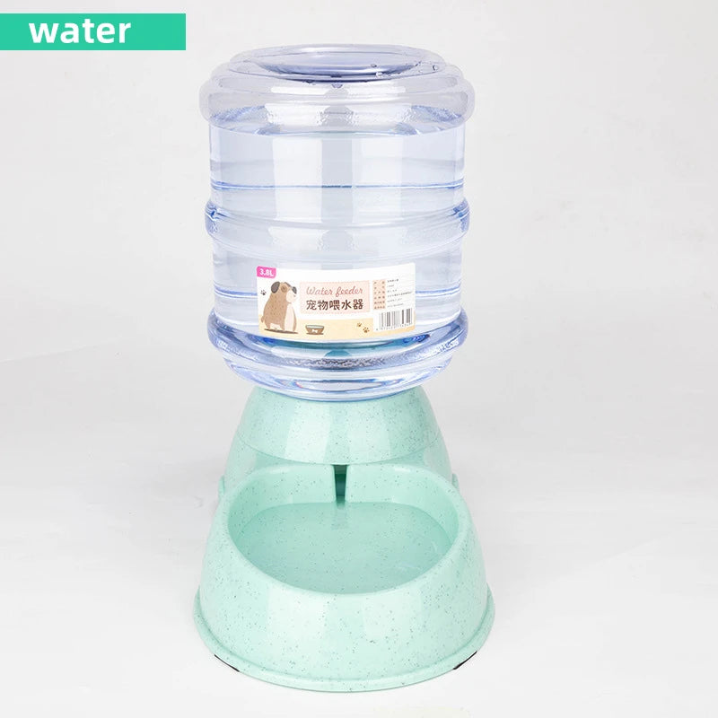 Clear pet water dispenser with a light green, speckled plastic base and a large, transparent refillable reservoir.