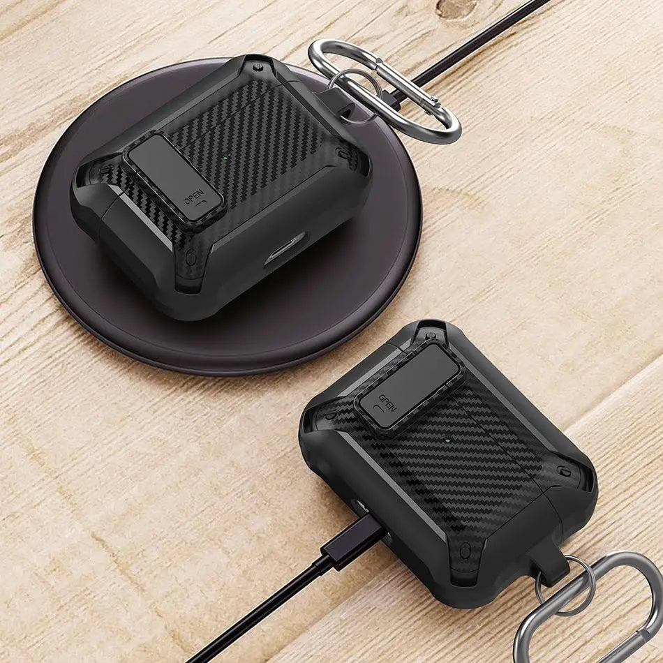 Rugged black carbon fibre-style protective case for AirPods with locking latch and carabiner, on a wireless charger.