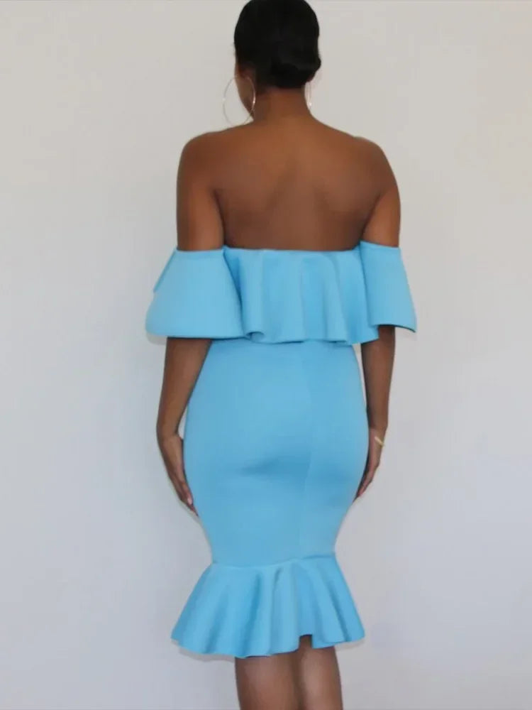 Back view of a sky-blue off-the-shoulder midi dress with ruffled sleeves and a ruffled hem.