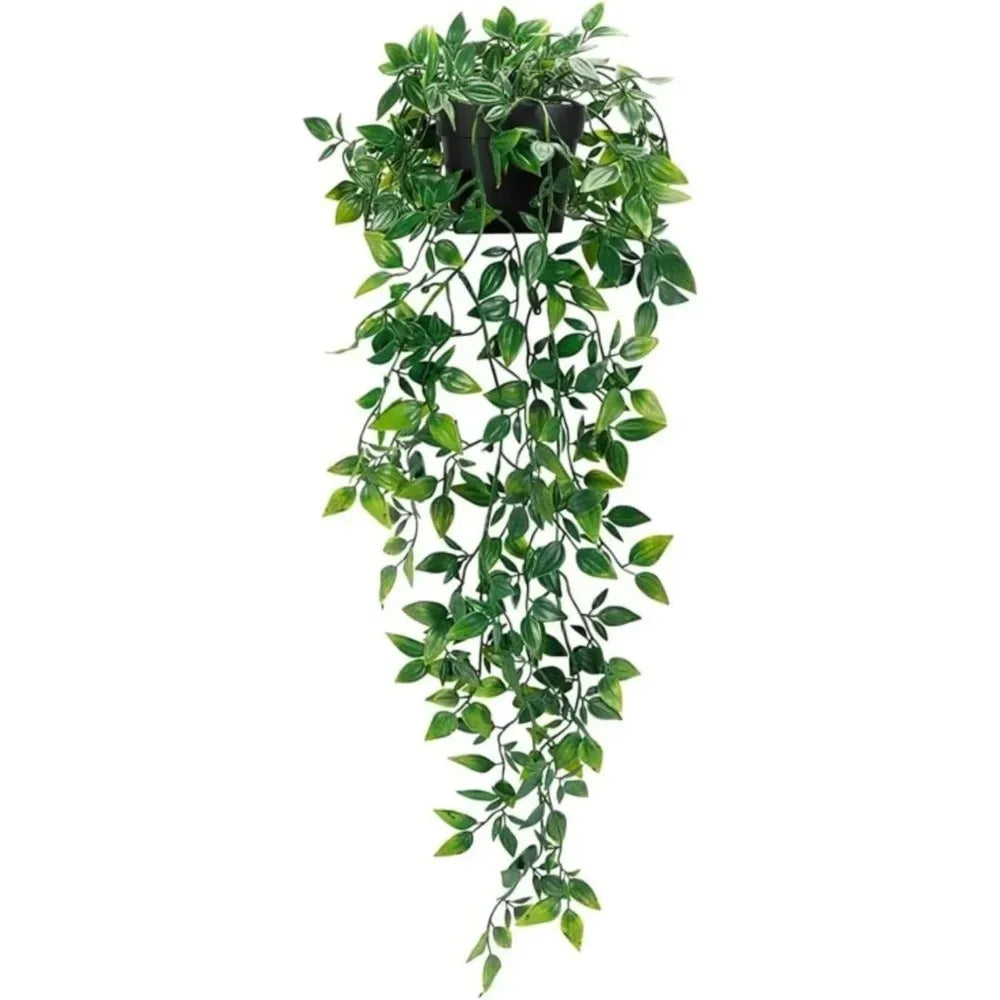 Trailing artificial ivy plant with variegated green leaves cascading from a small black pot against a white background.