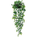 Trailing artificial ivy plant with variegated green leaves cascading from a small black pot against a white background.