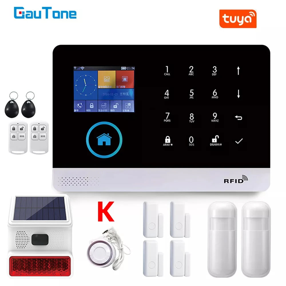 Smart home alarm kit with black and white touchscreen control panel, RFID tags, remote controls, and motion sensors.