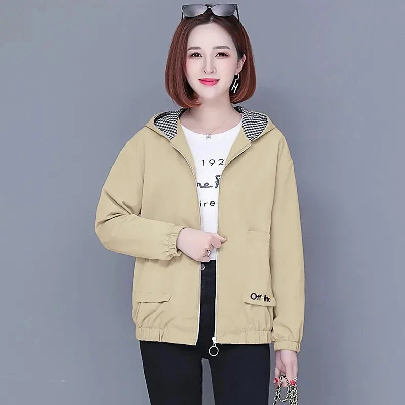 Beige zip-up jacket with a hooded, black and white checkered lining, elasticated cuffs, and front pockets.