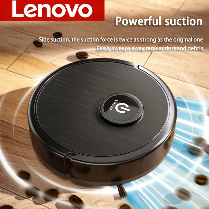 A black Lenovo robot vacuum cleaner with a power button, cleaning coffee beans on a wooden floor.