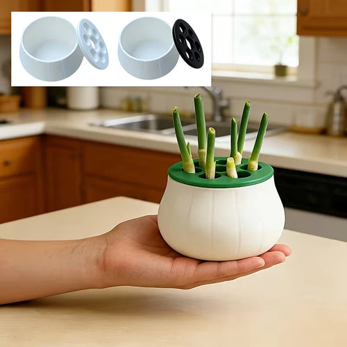 Hand holding a white, 3D-printed onion-shaped planter with a green lid holding green onion sprouts for hydroponics.