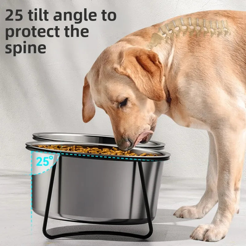 Large silver stainless steel elevated dog bowl on a black stand, angled at 25 degrees with a golden dog eating.