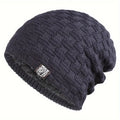 Dark grey men's beanie with a textured knitted pattern and soft, plush fleece lining.