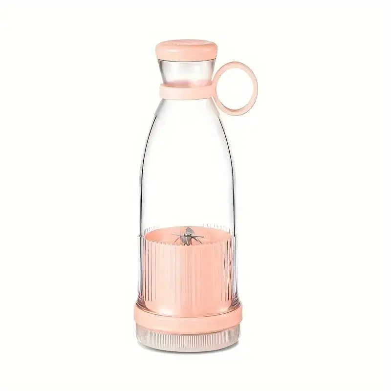 Portable pink blender bottle with a clear body, built-in blades, and a convenient ring handle.