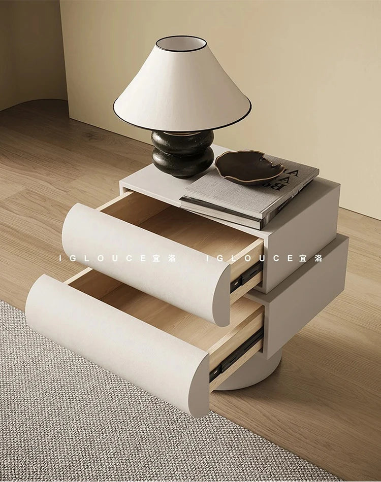 Modern off-white floating bedside table with two curved-front drawers and light wooden interiors.