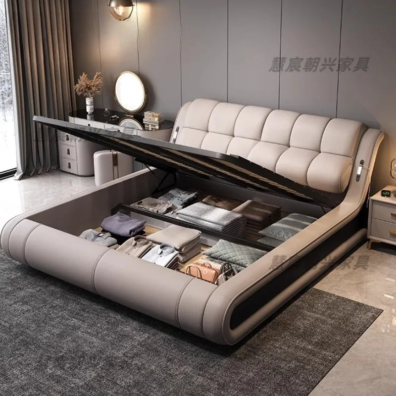 Modern beige genuine leather bed frame with an ottoman-style lift-up storage base in a contemporary bedroom.
