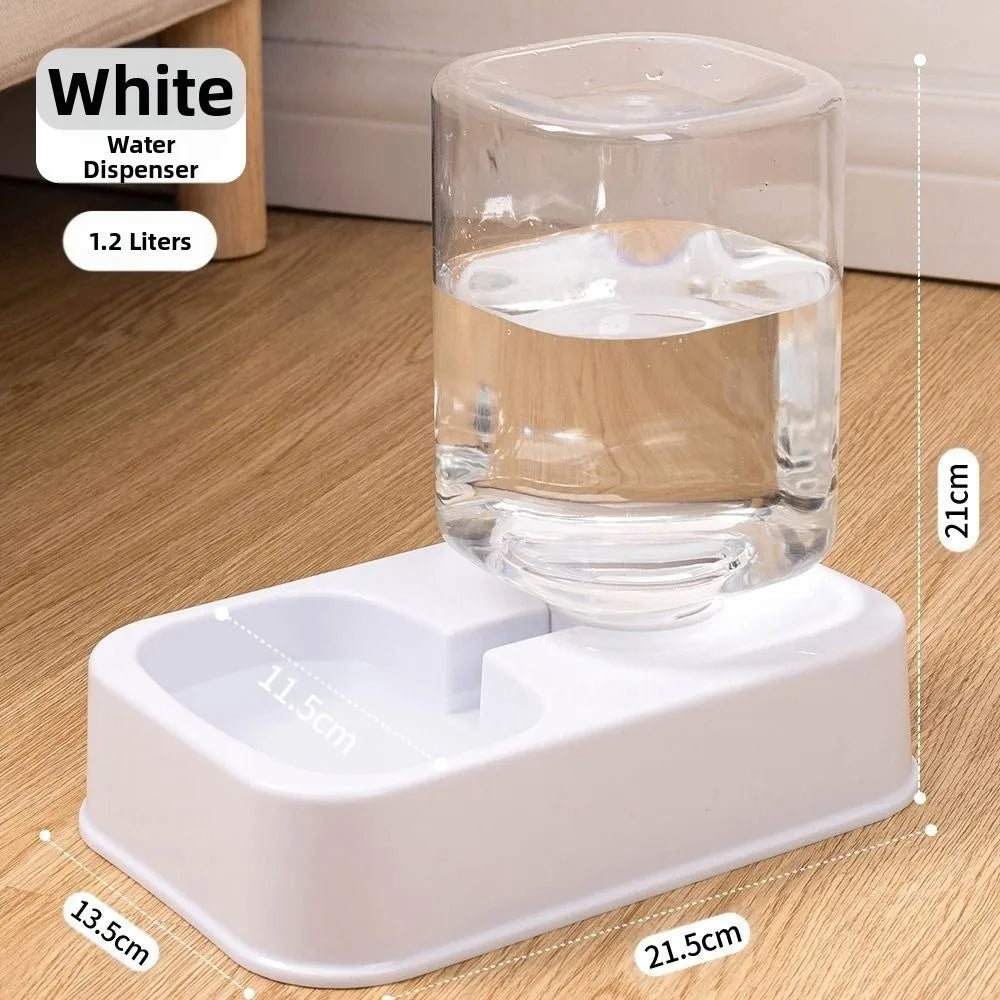 White 1.2L automatic pet water dispenser with a clear gravity bottle and a minimalist, rectangular white base.