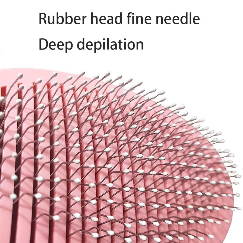 Pink pet grooming slicker brush with fine, white-tipped metal needles for gentle detangling.