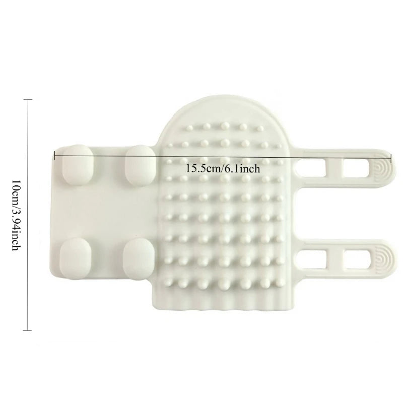 White silicone body scrubber with textured massage bristles, suction cups, and hand straps, showing size dimensions.