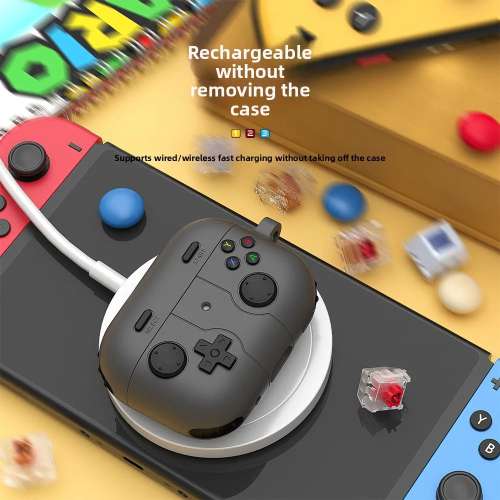 Dark grey silicone AirPods Pro case designed to resemble a retro gaming controller, placed on a wireless charger.