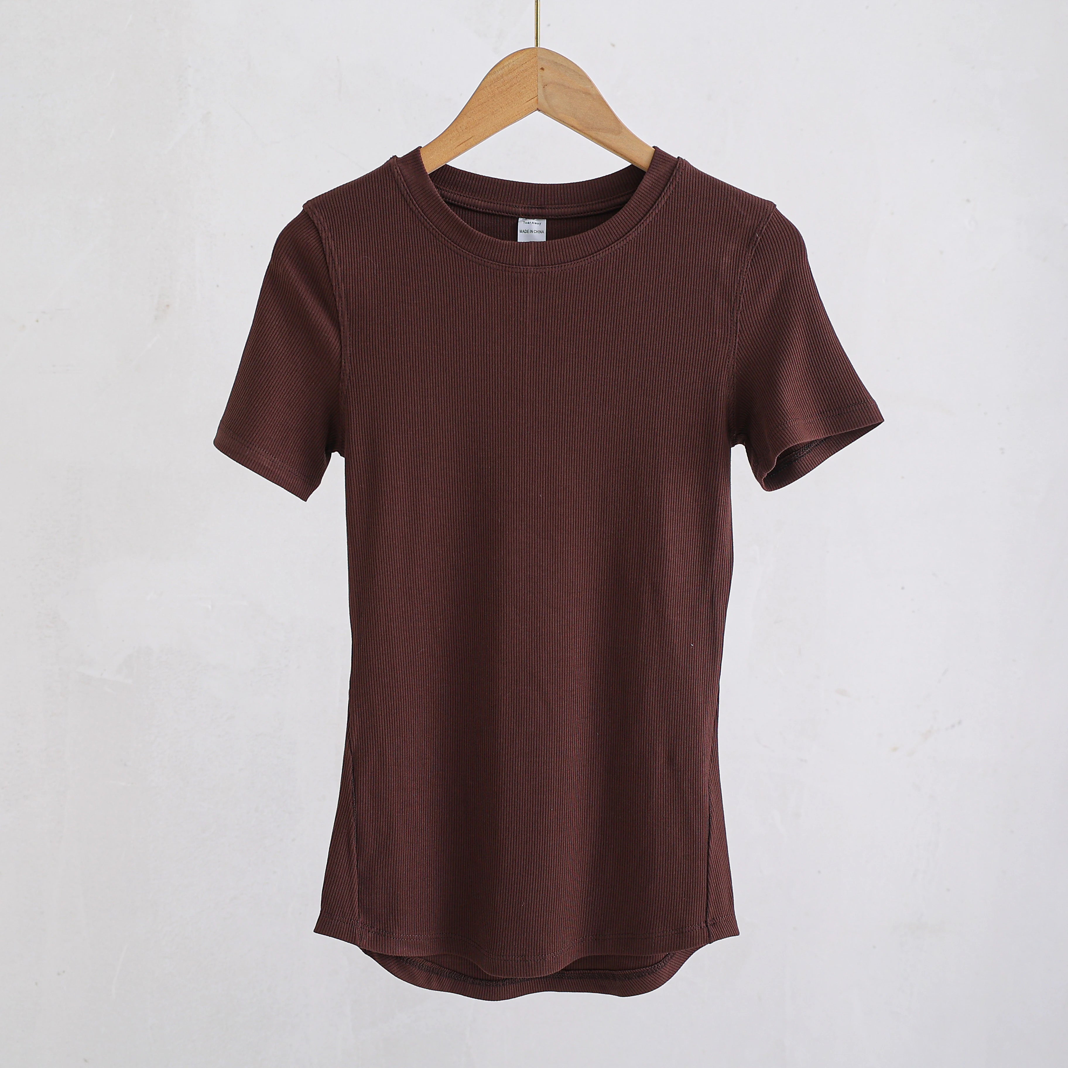 Dark brown short-sleeve t-shirt in a soft ribbed knit fabric with a classic round neckline and curved hem.